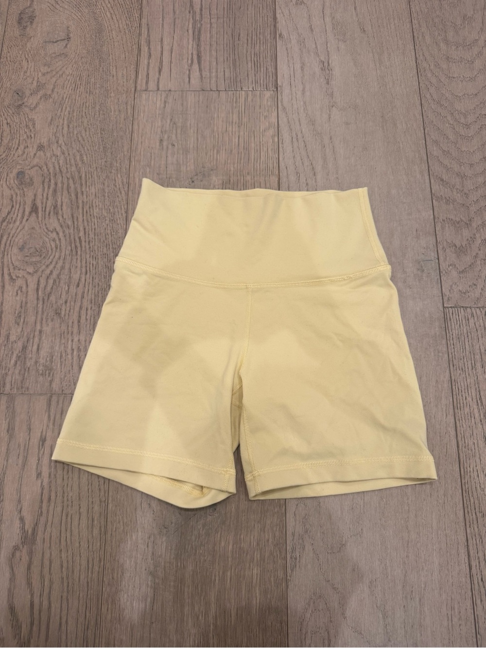 TNA High-Rise Pale Yellow Bike Shorts